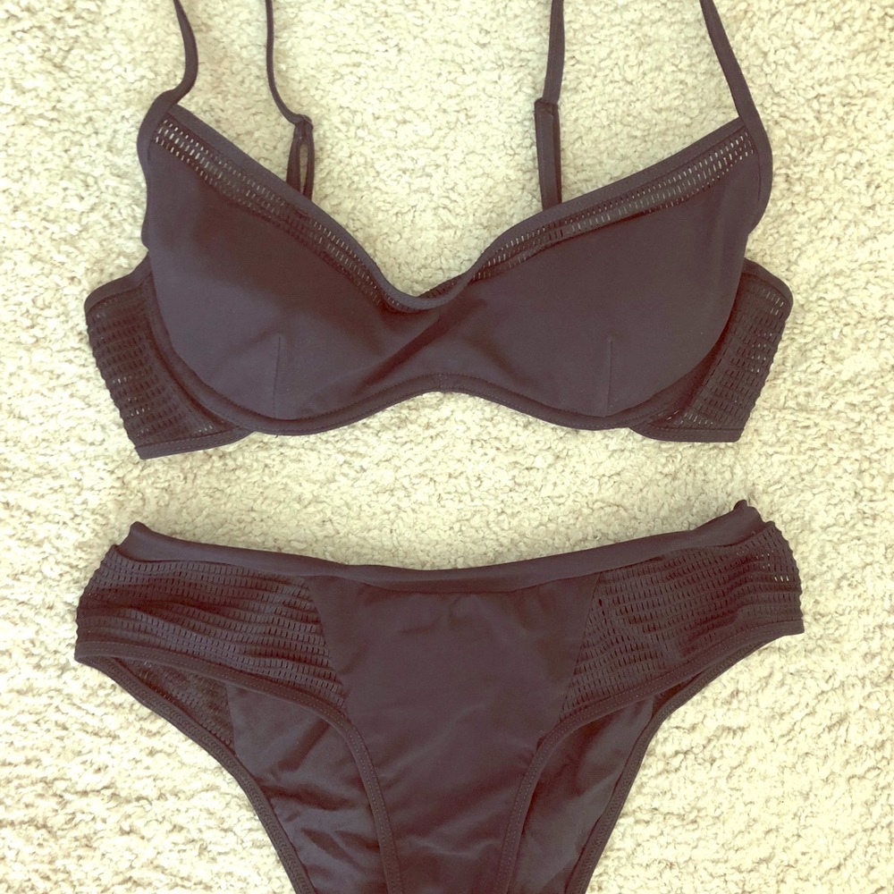 Sauvage brand black swimsuit. NWOT s/m